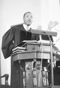 Prints of Civil rights leader Reverend Martin Luther King, Jr. delivers a sermon on May 13, 1956 in Montgomery, Alabama. (Photo by Michael Ochs Archives/Getty Images) Wales Prints: Martin Luther King, Jr. Sermon Print 1956