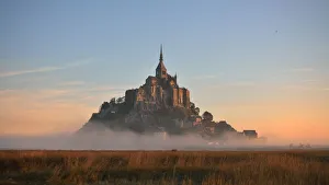 Mont-Saint-Michel Abbey at sunset, Normandy, France Mont-Saint-Michel Abbey at sunset, Normandy, France
