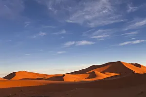 Moroccan desert landscape with blue sky. Dunes background Moroccan desert landscape with blue sky. Dunes background