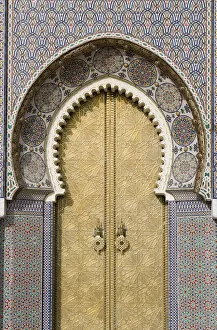 Morrocco, Fez, decorative arched doorway inlaid with tiles Morrocco, Fez, decorative arched doorway inlaid with tiles