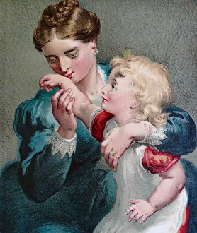 Mother kissing a place on the arm of daugther to make the injury well again Mother kissing a place on the arm of daugther to make the injury well again