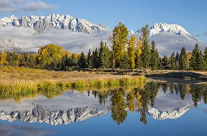 Mt. Moran and Teton Range reflecting in channel of Snake River, Schwabacher Landing, Grand Teton National Park, Wyoming Mt. Moran and Teton Range reflecting in channel of Snake River, Schwabacher Landing, Grand Teton National Park, Wyoming