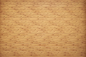 Natural colored wooden wall of rough boards Natural colored wooden wall of rough boards
