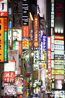 Neon signs light in Shinjuku, Tokyo, Japan Neon signs light in Shinjuku, Tokyo, Japan