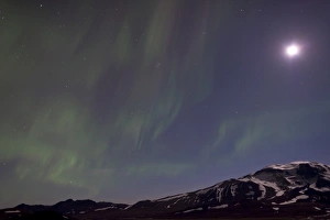 Northern Lights and Full Moon over Mt Snaefell, Highlands of Iceland, Northeastern Region Northern Lights and Full Moon over Mt Snaefell, Highlands of Iceland, Northeastern Region