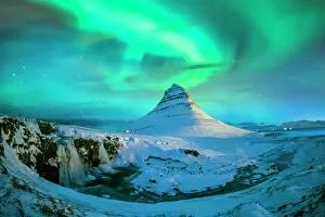 Northern lights at Mount Kirkjufell, Iceland Northern lights at Mount Kirkjufell, Iceland