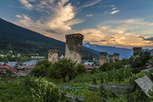 Old Georgian town with towers at sunset. Svaneti Old Georgian town with towers at sunset. Svaneti