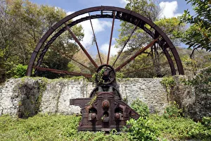 Old sugar cane mill, mill wheel, rusted, Trinidad and Tobago Old sugar cane mill, mill wheel, rusted, Trinidad and Tobago