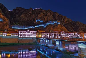 Ottoman houses on the Yesilirmak river and Castle Hill illuminated at night, Amasya Ottoman houses on the Yesilirmak river and Castle Hill illuminated at night, Amasya