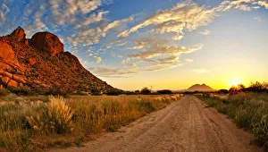 A Panoramic Sunset Landscape Photo of Spitzkoppe in Namibia, Erongo, Namibia A Panoramic Sunset Landscape Photo of Spitzkoppe in Namibia, Erongo, Namibia