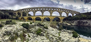 Panoramic view of the Pont du Gard in march at dusk, southern France Panoramic view of the Pont du Gard in march at dusk, southern France