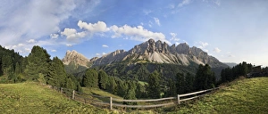Panoramic view as seen from the Wuerzjoch ridge with the Aferer Geisler Mountains and Peitlerkofel mountain at the back Panoramic view as seen from the Wuerzjoch ridge with the Aferer Geisler Mountains and Peitlerkofel mountain at the back