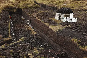 Peat cutting, Glencolumbcille, or Glencolumbkille, County Donegal, Ireland, Europe Peat cutting, Glencolumbcille, or Glencolumbkille, County Donegal, Ireland, Europe