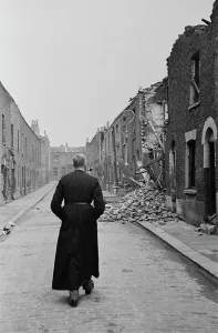 The London Blitz Prints: East End Parson Visits Damaged London Streets Print, 1940