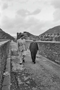Prints of Welsh actor Richard Burton crossing Y Bont Fawr, Pontrhydyfen Aqueduct, with his father, Richard Jenkins, during a visit to his birthplace, the village of Pontrhydyfen Wales Prints: Richard Burton with Father Crossing Aqueduct Print