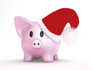 Piggy bank wearing a santa hat, 3D illustration Piggy bank wearing a santa hat, 3D illustration