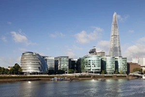 Promenade on the River Thames with City Hall and Shard skyscraper, London, England Promenade on the River Thames with City Hall and Shard skyscraper, London, England