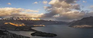 Queenstown on Lake Wakatipu and The Remarkbales mountain range at sunset, Otago Region, South Island, New Zealand Queenstown on Lake Wakatipu and The Remarkbales mountain range at sunset, Otago Region, South Island, New Zealand
