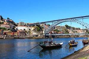 Rabelo boats and Dom Luis I bridge in Douro river, Porto Rabelo boats and Dom Luis I bridge in Douro river, Porto
