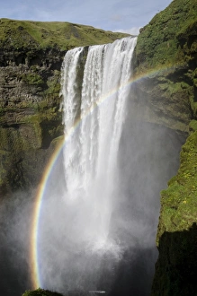 Rainbow, Skogafoss waterfall on the Skoga river, ring road, Suourland, Sudurland, southern Iceland, Iceland, Europe Rainbow, Skogafoss waterfall on the Skoga river, ring road, Suourland, Sudurland, southern Iceland, Iceland, Europe