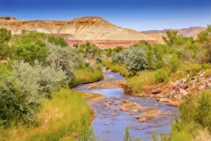 Red White Sandstone Mountain and Fremont River, Capitol Reef National Park, Torrey, Utah Red White Sandstone Mountain and Fremont River, Capitol Reef National Park, Torrey, Utah