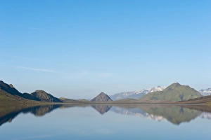 Reflection in the still lake, panoramic mountain landscape at Alftavatn lake, Laugavegur trekking route, Highlands Reflection in the still lake, panoramic mountain landscape at Alftavatn lake, Laugavegur trekking route, Highlands