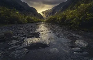 River in Franz Josef Glacier Valley, New Zealand River in Franz Josef Glacier Valley, New Zealand