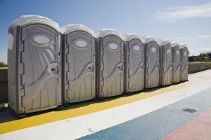 Row of portable toilets outdoors, Montreal, Quebec Province, Canada Row of portable toilets outdoors, Montreal, Quebec Province, Canada