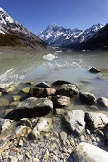 Scenery of high mountain with lake and high peak Scenery of high mountain with lake and high peak