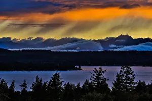 Scenic view of Olympic Mountains and Dyes Inlet at sunset, Bremerton, Washington State, USA Scenic view of Olympic Mountains and Dyes Inlet at sunset, Bremerton, Washington State, USA