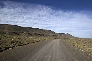 semi desert landscape , small Karoo , klein Karoo , dirt road cape town, south Africa semi desert landscape , small Karoo , klein Karoo , dirt road cape town, south Africa