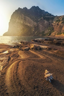 Seongsan Ilchulbong Peak with beach foreground Seongsan Ilchulbong Peak with beach foreground