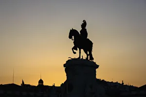 Silhouette of the equestrian statue of Jose I at sunset, Praca do Comercio, Lisbon Silhouette of the equestrian statue of Jose I at sunset, Praca do Comercio, Lisbon