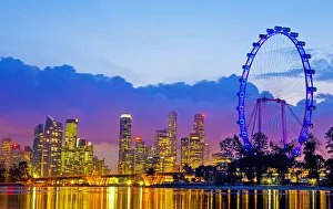 Singapore skyline and the Singapore Flyer at dusk Singapore skyline and the Singapore Flyer at dusk