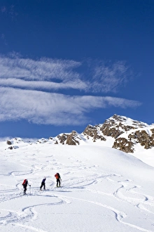 Ski hiker during the ascent of Staudenberg Joechl ridge in Ridnaun above Schneeberg Ski hiker during the ascent of Staudenberg Joechl ridge in Ridnaun above Schneeberg