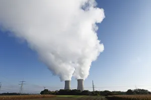 Smoke erupting from cooling towers of a nuclear power plant, Grafenrheinfeld, Schweinfurt, Lower Franconia, Franconia Smoke erupting from cooling towers of a nuclear power plant, Grafenrheinfeld, Schweinfurt, Lower Franconia, Franconia