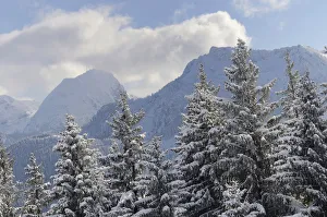 Snow clouds over winter mountain landscape, Mt Wendelstein and Mt Breitenstein Snow clouds over winter mountain landscape, Mt Wendelstein and Mt Breitenstein