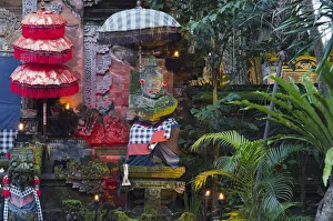 Stone figure, temple guards in the Pura Dalem Agung Padangtegal Temple, Ubud, Bali Stone figure, temple guards in the Pura Dalem Agung Padangtegal Temple, Ubud, Bali