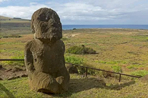 Stone sculpture in front of the Pacific Ocean, Easter Island, Chile Stone sculpture in front of the Pacific Ocean, Easter Island, Chile