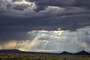 Storm clouds over prairie, New Mexico, USA Storm clouds over prairie, New Mexico, USA