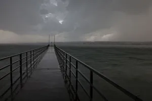 Stormy sky with rain over Lake Constance near Konstanz, Baden-Wuerttemberg, Germany Stormy sky with rain over Lake Constance near Konstanz, Baden-Wuerttemberg, Germany