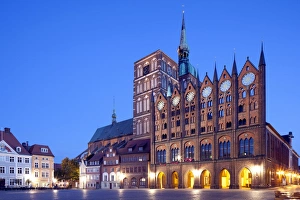 Stralsund Town Hall with origins from the 13th century, facade in the Old Market, next to St. Nicholas Church, Stralsund, Mecklenburg-Western Pomerania, Germany Stralsund Town Hall with origins from the 13th century, facade in the Old Market, next to St. Nicholas Church, Stralsund, Mecklenburg-Western Pomerania, Germany
