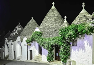 Street full of trulli houses at night, Alberobello Street full of trulli houses at night, Alberobello