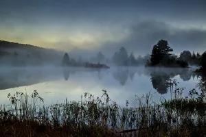 Streeter Pond in fog at dawn, New Hampshire, USA Streeter Pond in fog at dawn, New Hampshire, USA