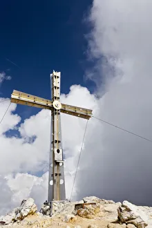 Summit cross on the summit of Sasshongher Mountain above Corvara, Puez Group Summit cross on the summit of Sasshongher Mountain above Corvara, Puez Group