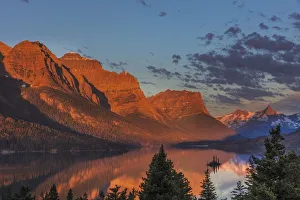 Sunrise clouds over Wild Goose Island and St. Mary Lake in Glacier National Park, Montana Sunrise clouds over Wild Goose Island and St. Mary Lake in Glacier National Park, Montana