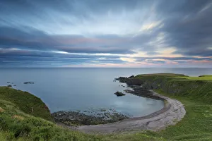 Sunset at Dunnottar Castle on the Scottish coast with moving cloud - Scotland Europe Sunset at Dunnottar Castle on the Scottish coast with moving cloud - Scotland Europe