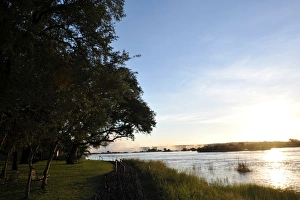 Sunset along The Victoria Falls in Zambia Sunset along The Victoria Falls in Zambia