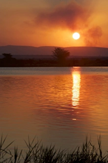 Sunset over water at Isimangaliso, Kwazulu-Natal, South Africa Sunset over water at Isimangaliso, Kwazulu-Natal, South Africa