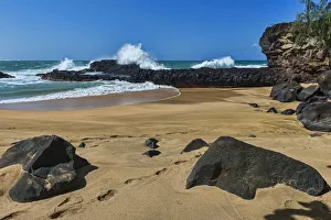 Surf at the coast, lava rocks, Kauai, Hawaii, United States Surf at the coast, lava rocks, Kauai, Hawaii, United States